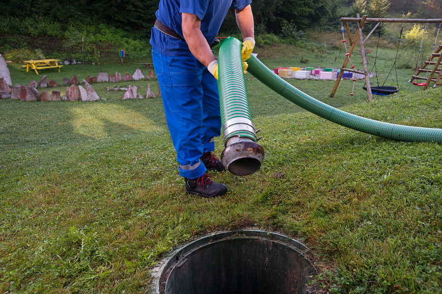 Emptying Household Septic Tank. Cleaning Sludge From Septic Syst