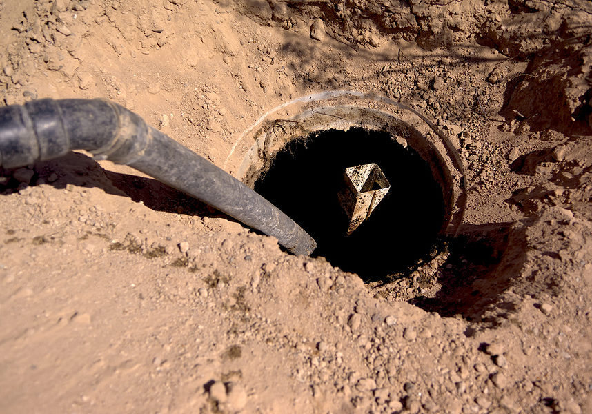 A Septic Tank Having The Waste Within It Pumped Out.